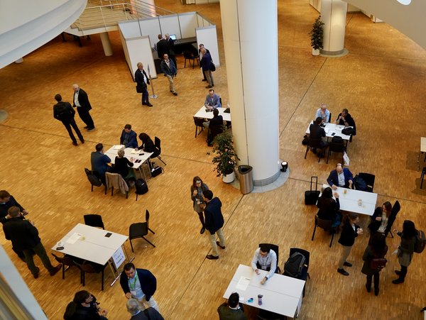 Image taken from above, visitors to an event.