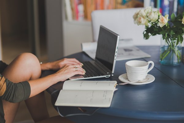 Table with laptop and coffe cup