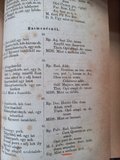 Photo of an old book page.